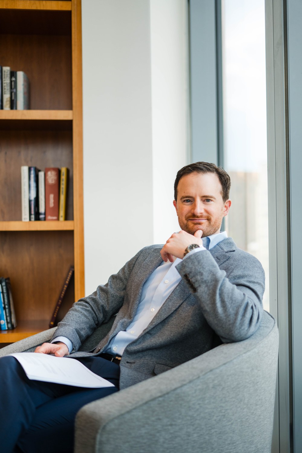 Tim Francis seated by a window in a Washington, DC office